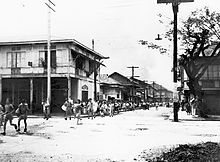 Citizens of Manila run for safety from suburbs burned by Japanese soldiers, 10 February 1945 ManilaEscape.jpg