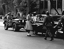 Soldiers from the 101st Airborne Division escort the Little Rock Nine to Central High School in Arkansas, September 1957 Operation Arkansas, Little Rock Nine.jpg