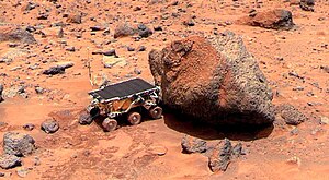 Sojourner takes Alpha Proton X-ray Spectrometer measurements of the Yogi Rock. Pathfinder01.jpg