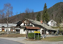 The village of Podreber with Kucelj Hill rising in the background