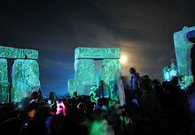Stonehenge is a site visited by New Age pilgrims, as seen in this midsummer rave. Rave in the Henge 2005.jpg
