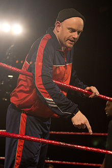 Causian male in a wrestling ring