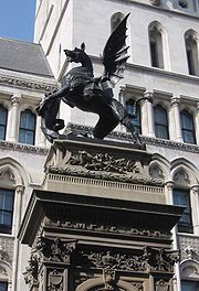 Dragon statue on the Temple Bar monument, which marks the boundary between the City of London and City of Westminster Temple-bar-griffin.jpg