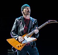 The Edge playing his signature guitar, the Gibson Explorer U2 performing in Belfast 10-27-18 (45611776892).jpg