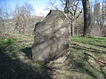 Runstenen U 92, som är från 1000-talet, ligger i en slänt i parken vid Jakobsbergs folkhögskola.