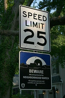 Speed limit and neighborhood watch signs in Durham, North Carolina, United States. 2008-07-04 Speed limit and neighbourhood watch sign in Durham.jpg