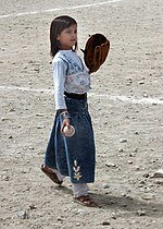 An Afghan girl playing baseball in August 2002 Afghan girl playing baseball in 2002.jpg
