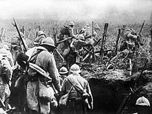 French soldiers storming out of their trench during the Battle of Verdun, 1916 Bataille de Verdun 1916.jpg