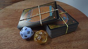 English: Cards and dice (used to mark life poi...