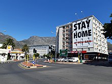 A billboard at the end of Long Street, Cape Town encourages people to stay at home during the lockdown period. Kloof & Long street billboard 20200401 140037.jpg