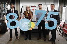 Keith Brown (SNP) and other Scottish campaigners, supporting an PS8.75 living wage in 2017 Living wage rises to PS8.75 (24358142978).jpg