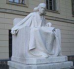 Monument to the Nobel Prize laureate of 1902 Theodor Mommsen by Adolf Brutt (1909), in the yard of the Humboldt University of Berlin Mommsen-Adolf Brutt-Mutter Erde fec.jpg