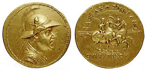 Gold 20-stater of Eucratides of Bactria c. 150 BC, the largest gold coin of antiquity. 169.2 grams, diameter 58 mm. Monnaie de Bactriane, Eucratide I, 2 faces.jpg