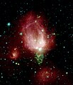 Der Reflexionsnebel NGC 7129 aufgenommen mit dem Spitzer-Weltraumteleskop