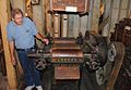 Don Ofe, the Site Administrator of the Neligh Mill, explains how a roller mill from 1888 grinds the wheat into flour.