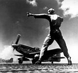 North American P-51 takes off from Iwo Jima.jpg