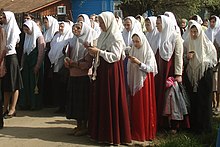 Women seen in modest dress outside a Russian Orthodox Christian, Old-Rite church Te Deum Elizarovo Guslitsa 8484.jpg