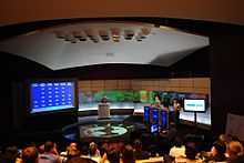 Employees demonstrating IBM Watson capabilities in a Jeopardy! exhibition match on campus, 2011 Watson Jeopardy demo.jpg