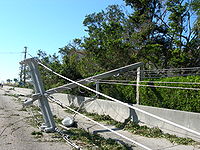 Even concrete power poles were snapped by the hurricane's winds.