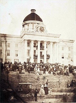 Jefferson Davis being sworn in as President of the Confederate States of America on February 18, 1861, on the steps of the Alabama State Capitol. 1861 Davis Inaugural.jpg