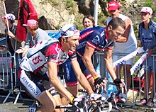 Basso (left) alongside Lance Armstrong at the 2004 Tour de France. Basso achieved his first Grand Tour stage victory at the race, on the twelfth stage. Basso Armstrong Tourmalet 2004.jpg