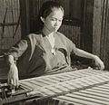 A weaver wearing bodo blouse, circa 1945–1955
