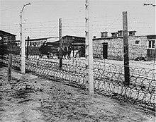 Fence at Flossenburg. Expensive security measures distinguished the concentration camps from other Nazi detention facilities. Fence at Flossenburg concentration camp.jpg