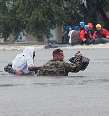 Rescue during Hurricane Matthew, Fayetteville, 2016 Hurricane Matthew 2016 Fayetteville, North Carolina, National Guard rescue (cropped).jpg