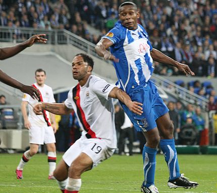 Joleon Lescott in action during Manchester City's away fixture against Lech Poznań in the Europa League