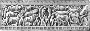 Wood carving of jungle animals at beginning of "Her Majesty's Servants"