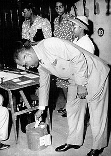 Houston dentist Lonnie E. Smith, plaintiff in the landmark Supreme Court case Smith v. Allwright, casts his ballot in the 1944 Texas Democratic primary election (July 22, 1944). Lonnie-Smith-1944.jpg