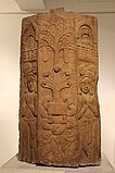 Pillar with Naga Mucalinda protecting the throne of the Buddha. Pauni, 2nd-1st century BCE. National Museum of India.[85]