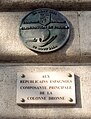 Plaque in commemoration of the Spanish soldiers of La Nueve, affixed to the annexe building of the Hôtel de Ville, on the corner of Quai de l'Hôtel de Ville and Rue de Lobau (4th Arrondissement).