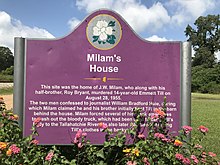 Sign identifying the site of Milam's house, near Glendora Gin.