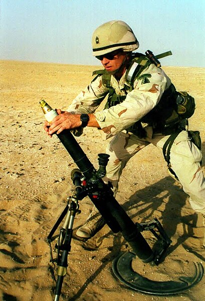 ملف:Soldier firing M224 60mm mortar.jpg