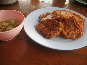 Tod man pla krai with dipping sauce