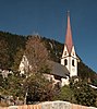 Trins Dorfplatz mit Kirche (cropped).jpg