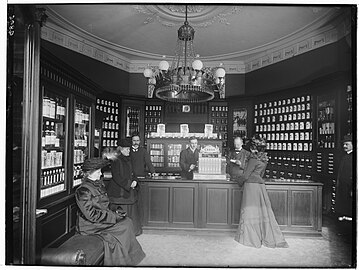 The interior of the pharmacy photographed by Peter Elfelt (1903)