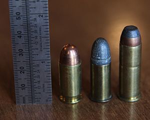 .44 S&W American with ruler, .45 ACP, and .44 Magnum.JPG