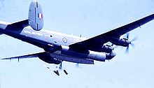 A Shackleton, possibly of 204 sqn, performing a mail drop over Beira street, September 1971, photographed from aboard HMS Minerva 49 Mail drop Beira Strait Sept1971.jpg