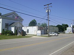 Township building with fire department and church in the background