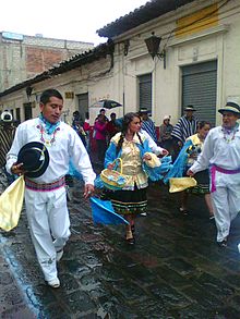 Parade in Latacunga, Ecuador Comparsa latacunguena desfilando.jpg