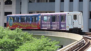 A Detroit People Mover train approaching Millender Center station