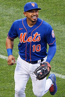 Eduardo Escobar smiles while running to the dugout, Aug 06 2022 (cropped 2).jpg