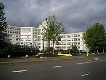 The bank plans to move most of its central functions back in 2025 to the former AMRO head office in Amsterdam-Zuidoost, known as "De Fop" Foppingadreef 22.jpg
