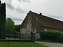 Gutsanlage (Anlage und Grundriss des Gutshofes sowie Anordnung der Baukörper) mit Gutshaus, Nebengebäuden und Park