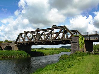 The railway crosses the River Parrett between Langport East station and the junction with the Yeovil Branch Line. Langport River Parrett rail bridge.jpg