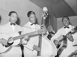 Lonnie Johnson and band playing in Chicago, 19...