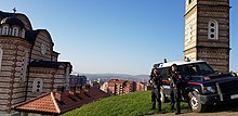 KFOR-MSU Carabinieri patrol in Mitrovica near the St. Dimitri Orthodox Church (2017). MSU Carabinieri Mitrovica Summer 2017.jpg