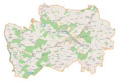 Mapa konturowa powiatu kraśnickiego, po lewej znajduje się punkt z opisem „Stary Rachów”